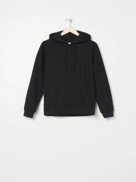 Bluza z kapturem - czarny. Czarne bluzy damskie Sinsay, l, bez wzorów, z dresówki, sportowe, bez ramiączek, z kapturem. Za 35.99 zł.