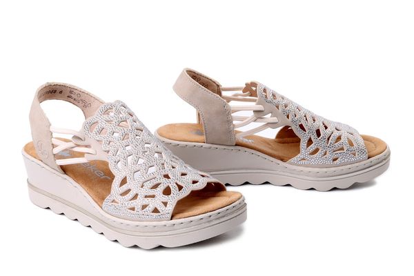 RIEKER 67465-62 beige, sandały damskie. Brązowe sandały damskie Rieker, bez wzorów, bez obcasa, bez zapięcia. Za 287.91 zł.