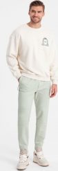 Ombre Męskie spodnie joggery dresowe na gumce z przeszyciami miętowe V3 OM-PASK-0142 XL. Zielone spodnie sportowe męskie Ombre, m, bez wzorów, z dresówki. Za 59.99 zł.