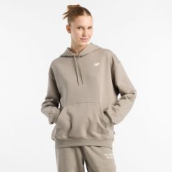 Bluza damska New Balance WT51947DOK – beżowa. Brązowe bluzy damskie New Balance, xl, bez wzorów, z bawełny, klasyczne, bez ramiączek, z kapturem. Za 169.99 zł.