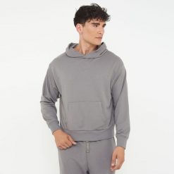 Unisex bluza z kapturem F BOXY ciemnoszara. Szare bluzy damskie Legea, s, bez wzorów, z bawełny, bez ramiączek, z kapturem. Za 96.00 zł.