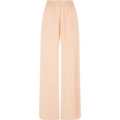 Damskie spodnie z szeroką nogawką z wiskozy Urban Classics. Zielone spodnie dresowe damskie Urban Classics, bez wzorów, z wiskozy, sportowe, długie. Za 214.00 zł.