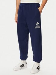 Adidas Spodnie dresowe Seasonal Essentials Collegiate French Terry Cuffed KG0521 Granatowy Regular Fit. Niebieskie spodnie sportowe męskie Adidas, m, bez wzorów, z bawełny. Za 239.99 zł.