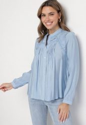 Jasnoniebieska Koszula z Ozdobnym Haftem Nanania. Niebieskie koszule damskie Born2be, l, bez wzorów, z jeansu, eleganckie, bez kołnierzyka, bez ramiączek. Za 129.99 zł.