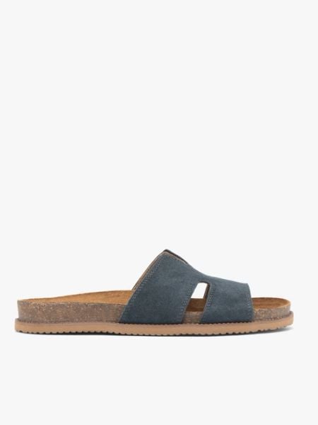 Granatowe klapki. Niebieskie klapki damskie Ryłko, bez wzorów, ze skóry, eleganckie, bez obcasa, na płaskiej podeszwie, bez zapięcia. Za 349.99 zł.