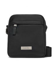 Calvin Klein Saszetka Sleek Reporter LV04D3180G Czarny. Czarne saszetki i nerki męskie Calvin Klein, bez wzorów, z materiału. Za 299.99 zł.