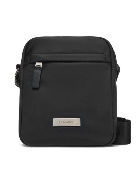 Calvin Klein Saszetka Sleek Reporter LV04D3180G Czarny. Czarne saszetki i nerki męskie Calvin Klein, z materiału. Za 239.99 zł.