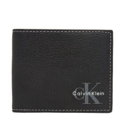 Portfel Calvin Klein. Czarne portfele męskie Calvin Klein, bez wzorów. Za 329.99 zł.