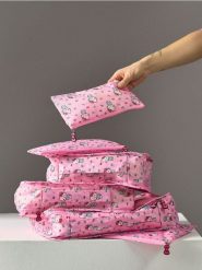 Zestaw organizerów do walizki 6 pack Hello Kitty - różowy. Czerwone walizki damskie Sinsay, bez wzorów. Za 35.99 zł.