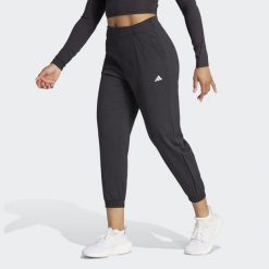 Spodnie dresowe damskie adidas AEROREADY. Białe spodnie dresowe damskie Adidas, bez wzorów, z dresówki, sportowe, na fitness i siłownię. Za 221.00 zł.