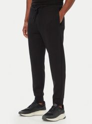 BOSS Spodnie dresowe Hadiko 50565748 Czarny Regular Fit. Czarne spodnie sportowe męskie Boss, m, bez wzorów, z bawełny. Za 629.99 zł.