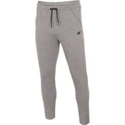 Spodnie dresowe męskie SPMD302 - średni szary melanż. Szare spodnie sportowe męskie 4F, m, bez wzorów, z dresówki. Za 139.99 zł.