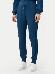 Guess Spodnie dresowe V2YB18 K7UW2 Niebieski Regular Fit. Niebieskie spodnie dresowe damskie Guess, z aplikacjami, z dresówki. Za 209.99 zł.