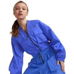 Kurtka Puma Dare To Woven, Kobiety. Niebieskie kurtki sportowe damskie Puma, bez wzorów, z nylonu, bez ramiączek, bez kaptura, do biegania. Za 390.00 zł.