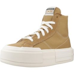 Buty CONVERSE CONVERSE CRUISE SUEDE Jasnobrązowy. Brązowe obuwie sportowe damskie Converse, bez wzorów, z tkaniny, bez zapięcia. Za 306.99 zł.