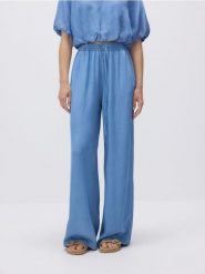 Jeansy wide leg z lyocellu - niebieski. Niebieskie jeansy damskie Reserved, bez wzorów, z jeansu. Za 139.99 zł.