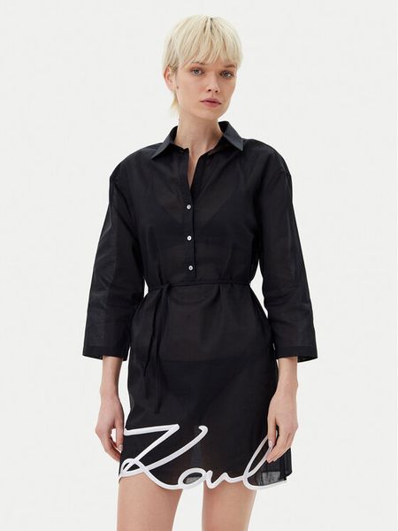 KARL LAGERFELD Sukienka koszulowa A1W46006 Czarny Regular Fit. Czarne sukienki damskie KARL LAGERFELD, xs, bez wzorów, z bawełny, bez kołnierzyka, bez ramiączek, koszulowe. Za 399.99 zł.