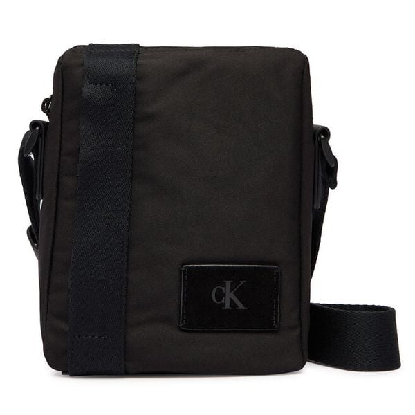 Saszetka Calvin Klein. Czarne saszetki i nerki męskie Calvin Klein, bez wzorów. Za 206.99 zł.