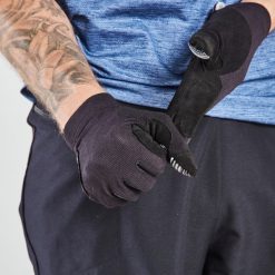 Rękawiczki rowerowe MTB Rockrider ST 100. Czarne rękawiczki damskie ROCKRIDER, bez wzorów, z materiału. W wyprzedaży za 49.99 zł.