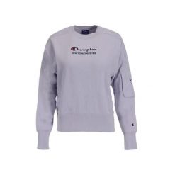 Damska bluza Champion Crewneck Sweatshirt 113314-VS059. Fioletowe bluzy damskie Champion, xs, bez wzorów, z bawełny, sportowe, bez ramiączek, bez kaptura. Za 237.72 zł.