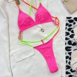 Strój kąpielowy stringi elastyczny materiał plaża aktywności wodne Benedetta. Czerwone stroje kąpielowe damskie Intica, l, bez wzorów, z materiału. Za 129.00 zł.