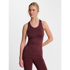 Damski bezszwowy tank top Hummel TIF. Brązowe topy damskie Hummel, bez wzorów, z tkaniny, sportowe, bez kołnierzyka, bez ramiączek. Za 163.50 zł.