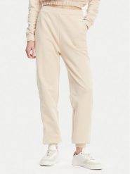 Calvin Klein Jeans Spodnie dresowe J20J225355 Beżowy Regular Fit. Brązowe spodnie dresowe damskie Calvin Klein Jeans, bez wzorów, z bawełny. Za 239.99 zł.