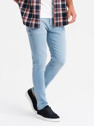 Dopasowane jeansowe spodnie męskie SLIM FIT z elastanem błękitne V3 OM-PADP-0214 S. Niebieskie spodnie sportowe męskie Ombre, m, bez wzorów, z elastanu. Za 302.57 zł.