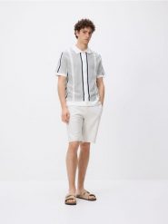 Rozpinany sweter z kołnierzem - jasnozielony. Zielone swetry męskie Reserved, l, bez wzorów, z bawełny, bez kołnierzyka, bez ramiączek. Za 139.99 zł.