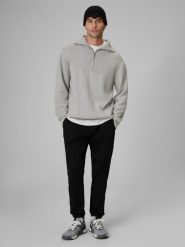 4F Spodnie casual joggery męskie - czarne XXL. Czarne spodnie materiałowe męskie 4F, bez wzorów, z bawełny, z standardowym stanem. Za 179.99 zł.