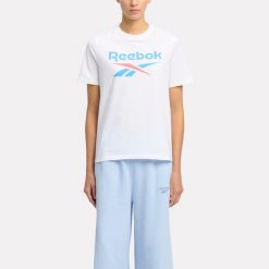 Koszulka damska Reebok Gym & Pilates. Bluzki damskie Reebok, l, bez wzorów, z bawełny, klasyczne, bez kołnierzyka, bez ramiączek. W wyprzedaży za 89.99 zł.