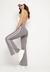 Szare Marszczone Legginsy Dzwony z Wysokim Stanem i Lampasami Nakatia. Szare legginsy damskie Born2be, bez wzorów, z jeansu. Za 59.99 zł.