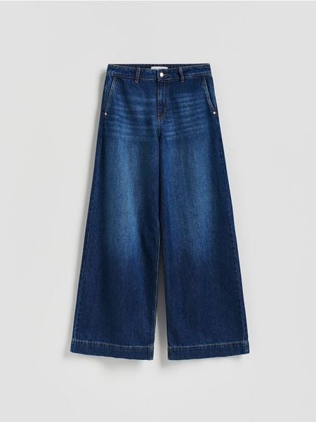 Jeansy wide leg - granatowy. Niebieskie jeansy damskie Reserved, bez wzorów, z bawełny. W wyprzedaży za 99.99 zł.