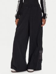 Adidas Spodnie dresowe Adibreak adicolor Adilenium JV7486 Czarny Oversize. Czarne spodnie dresowe damskie Adidas, bez wzorów, z dresówki. Za 309.99 zł.