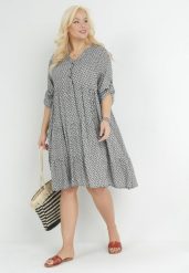 Czarna Rozkloszowana Sukienka z Falbanką i Podwijanymi Rękawami Arilanie. Czarne sukienki damskie Born2be, l, bez wzorów, eleganckie, bez kołnierzyka, bez ramiączek, midi, rozkloszowane. Za 79.99 zł.