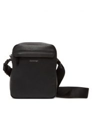 Calvin Klein Saszetka Ck Must Reporter LV04D3083G Czarny. Czarne saszetki i nerki męskie Calvin Klein, bez wzorów, ze skóry. Za 259.99 zł.