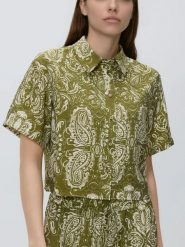 Koszula z wiskozą - oliwkowy. Zielone koszule damskie Reserved, l, bez wzorów, z tkaniny, bez kołnierzyka, bez ramiączek. Za 99.99 zł.