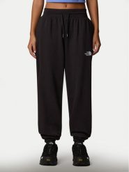 The North Face Spodnie dresowe Essential NF0A8C1G Czarny Relaxed Fit. Czarne spodnie dresowe damskie The North Face, bez wzorów, z dresówki. Za 329.99 zł.