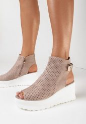 Beżowe Sandały Loraeleh. Brązowe sandały damskie Born2be, bez wzorów, bez obcasa, na koturnie, bez zapięcia. Za 129.99 zł.
