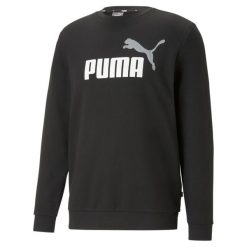 Męski sweter z okrągłym dekoltem i dużym dwukolorowym logo Essentials+ PUMA. Białe swetry męskie Puma, m, bez wzorów, bez kołnierzyka, bez ramiączek. Za 186.58 zł.