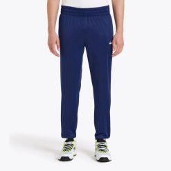Spodnie dresowe męskie DIADORA PANTS DIADORA CLUB. Niebieskie spodnie sportowe męskie Diadora, m, bez wzorów, z dresówki, na fitness i siłownię. Za 89.99 zł.