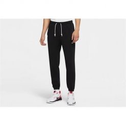 Spodnie sportowe męskie Nike Standard Issue. Brązowe spodnie sportowe męskie Nike, m, bez wzorów, z dresówki, trekkingowe. Za 362.00 zł.
