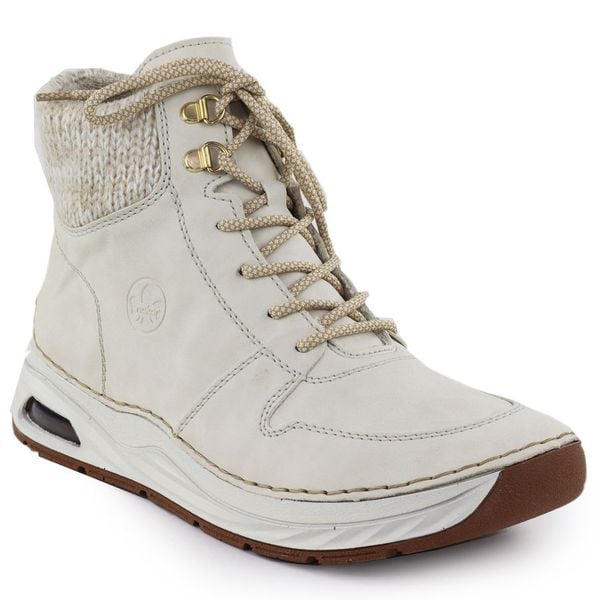 Botki damskie ocieplane trapery beżowe Rieker 44555-60. Brązowe trapery damskie Rieker, ze skóry ekologicznej, bez zapięcia. Za 389.00 zł.