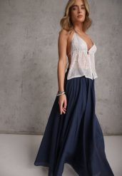 Granatowa Rozkloszowana Spódnica z Bawełny w Stylu Preppy Petrra. Niebieskie spódnice damskie Renee, na co dzień, bez wzorów, z bawełny, maxi, dopasowane. Za 149.99 zł.