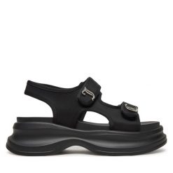 Sandały Juicy Couture. Czarne sandały damskie Juicy Couture, bez wzorów, bez obcasa, na płaskiej podeszwie, bez zapięcia. Za 249.99 zł.