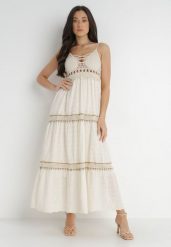Jasnobeżowa Sukienka Chrysis. Brązowe sukienki damskie Born2be, m, z aplikacjami, z bawełny, boho, bez kołnierzyka, bez ramiączek, maxi, rozkloszowane. Za 199.99 zł.
