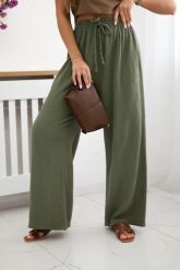 Spodnie muślinowe z szeroką nogawką khaki. Brązowe spodnie materiałowe damskie KESI, na lato, bez wzorów, z bawełny, biznesowe, plus size. Za 150.52 zł.