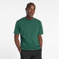 Koszulka męska New Balance MT41533NWG – zielona. Zielone koszulki sportowe męskie New Balance, m, bez wzorów, z dresówki, bez ramiączek. Za 69.99 zł.