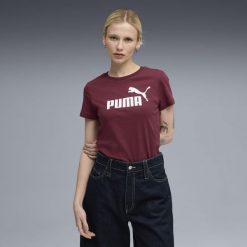 Damska koszulka z logo ESS No. 1 PUMA Ruby Shimmer Red. Czerwone bluzki damskie Puma, bez wzorów, sportowe, bez kołnierzyka, bez ramiączek. Za 135.64 zł.