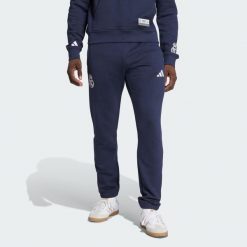 Spodnie Real Madrid US Pack. Białe spodnie sportowe męskie Adidas, l, bez wzorów, z dresówki, do piłki nożnej. Za 299.00 zł.